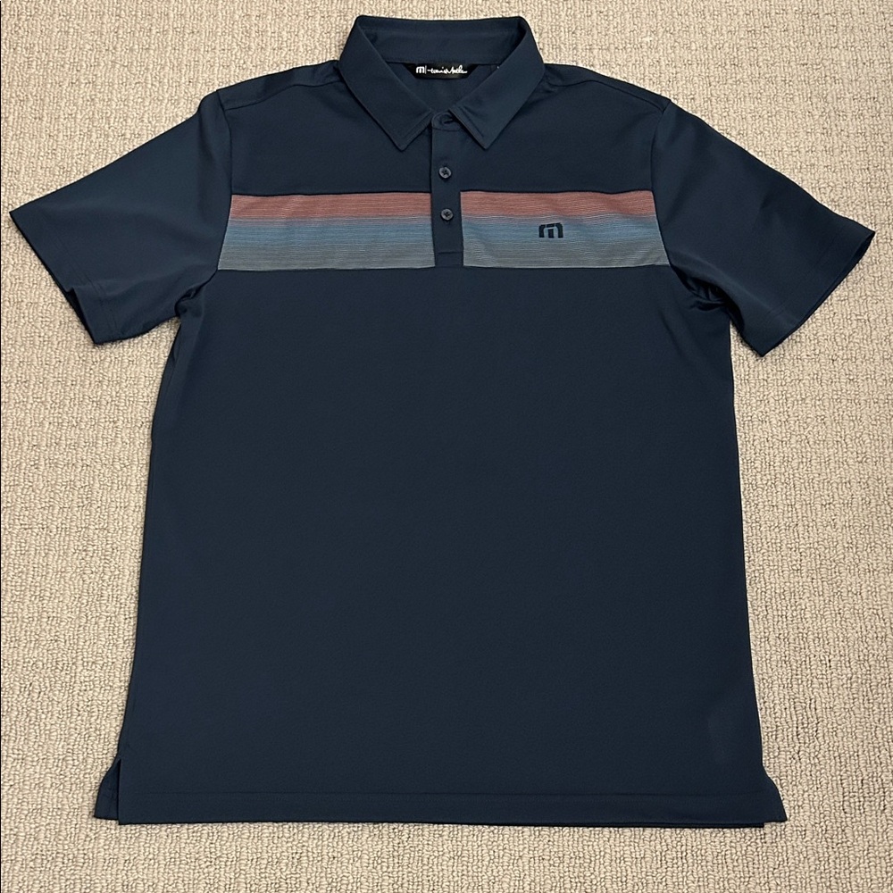 Travis Mathew Navy Polo with Red and Blue Accents